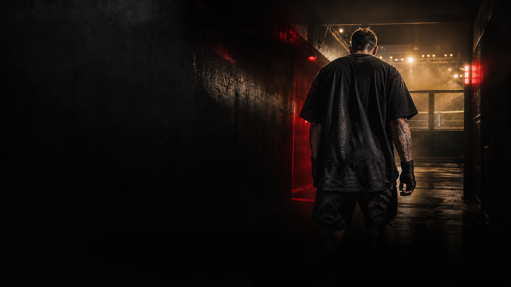 Athlete walking through an arena tunnel in premium fightwear